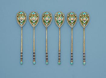 A set of six Russian 19th century silver-gilt and enamle tea-spoons, unidentified makers mark, St. Petersburg.