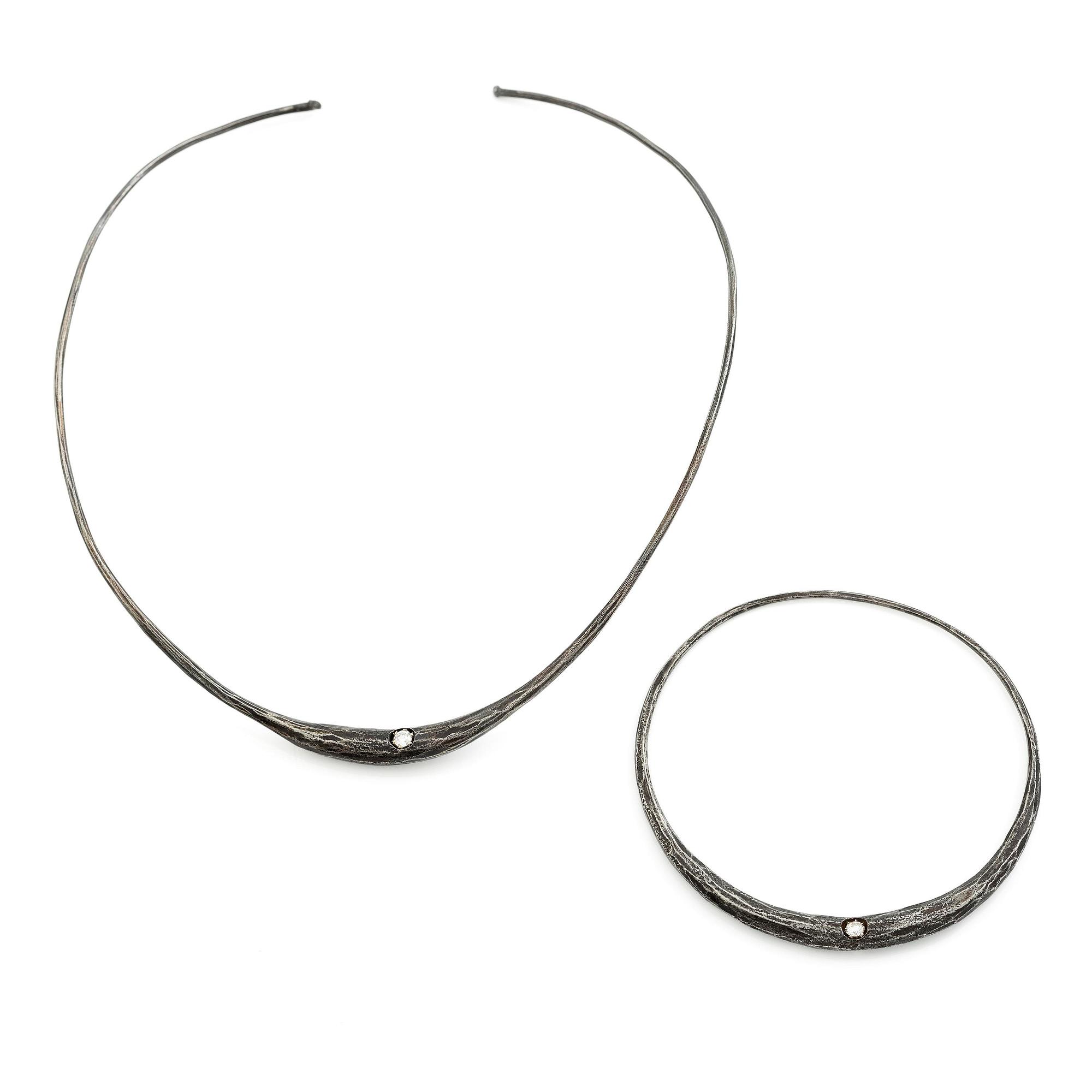 PA Lundahl-Terrs, a necklace and a bracelet, iron and round brilliant-cut diamonds.