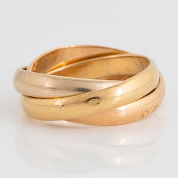 An 18K gold Cartier "Trinity" ring.