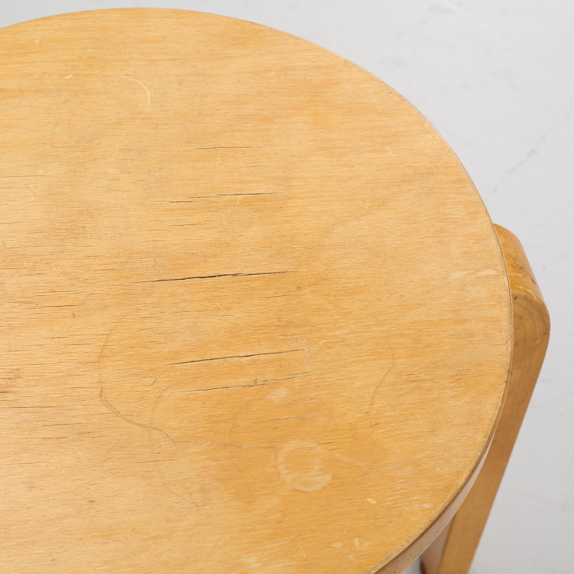 Alvar Aalto, a pair of model 60 stools, Artek, mid 20cth century.