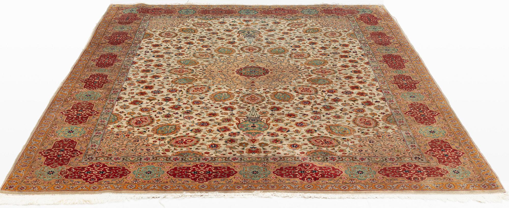 A carpet, semi-antique, Tabriz, ca 298 x  228 cm.