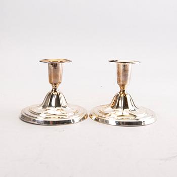 A Swedish 20th century pair of sivler candle sticks mark of CG Hallberg Stockholm 1954.