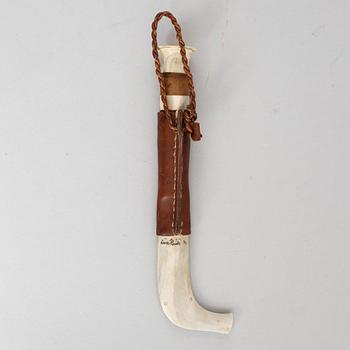 Lars Pirak, a reindeer horn knife, signed.