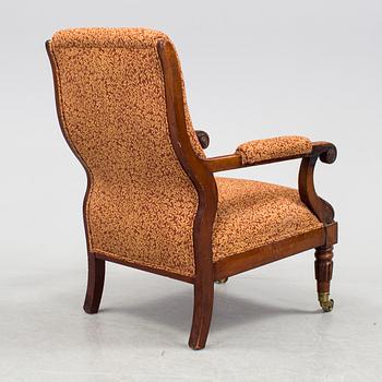 A mid 1800s easy chair.