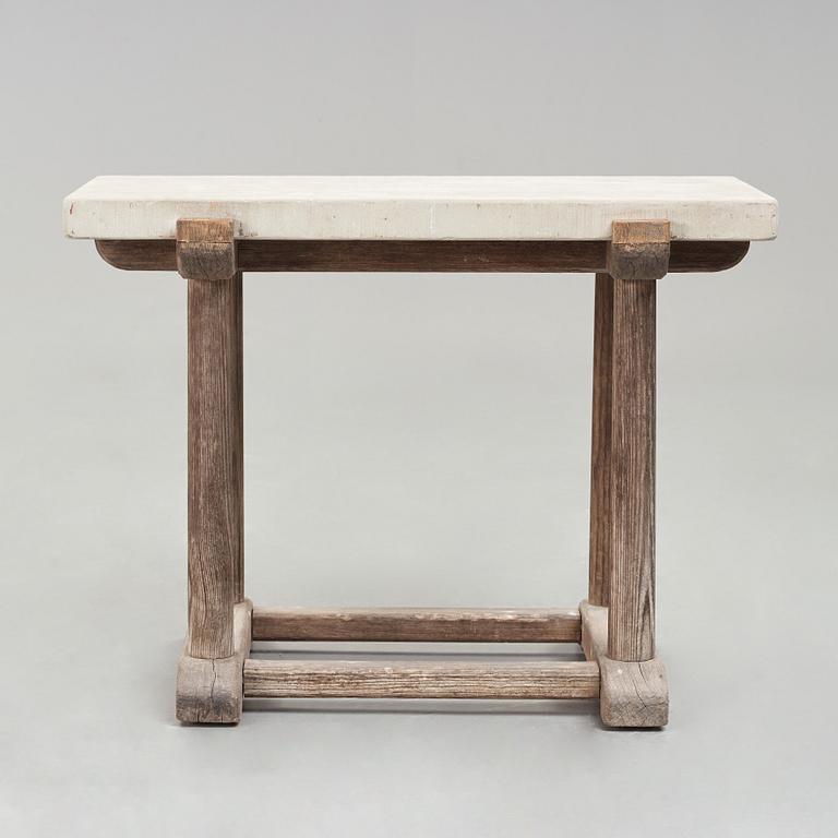 Axel Einar Hjorth, a "Sandhamn" stained pine table with a limestone top, Nordiska Kompaniet, Sweden 1929.