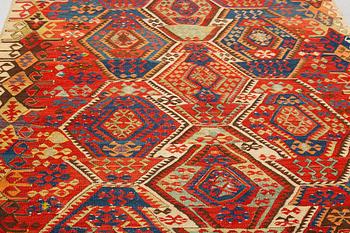 A carpet, antique/semi-antique Anatolian kilim, ca 292-301 x 125-135 cm.