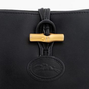 Longchamp, a leather bag.