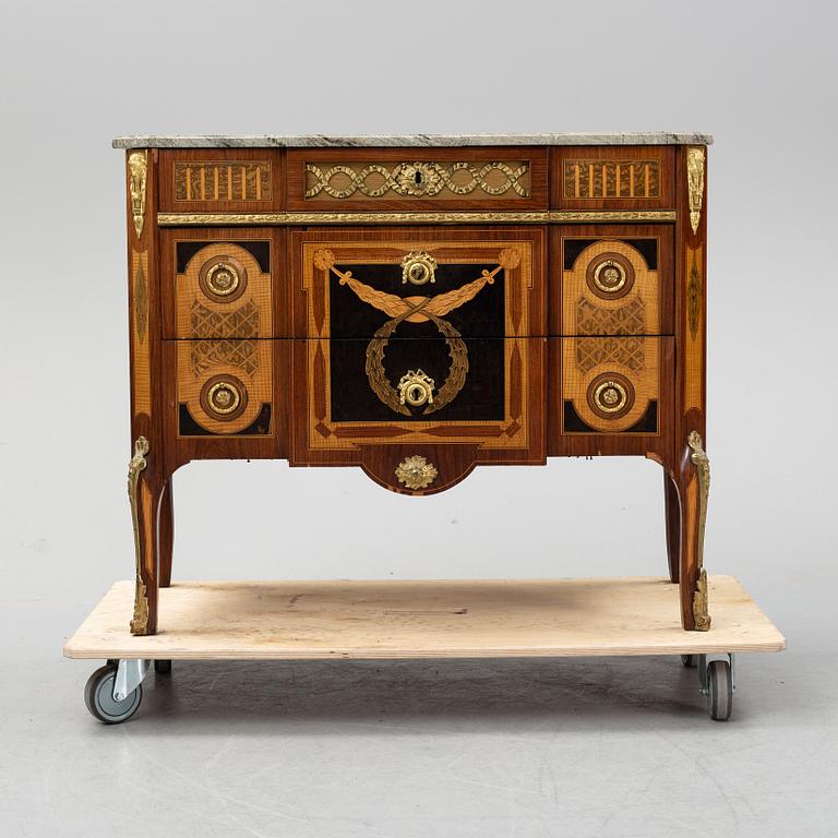 A late Gustavian style chest of drawers, from around the year 1900.