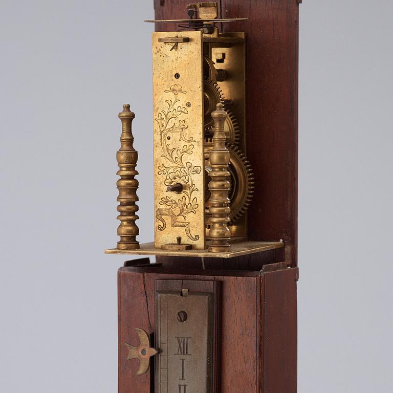 A Japanese 19th century pillarclock.