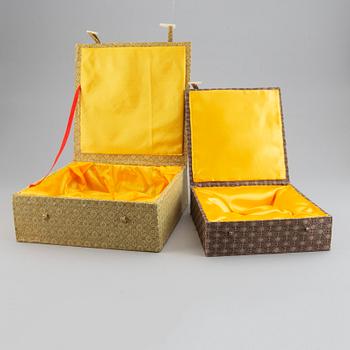 A set of six silk clad boxes, China, 20th Century.