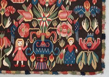 CARRIAGE CUSHION, tapestry weave. "Flower cushion with stylized vases and people". 47 x 101 cm. South of Scania, Sweden, the second half of the 18th century til early 19th century. Probably Torna district.