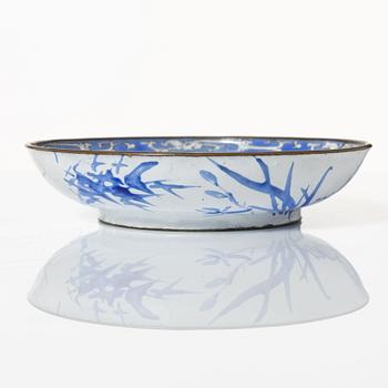 A fine Canton enamel 'landscape' dish, Qing dynasty, 18th Century.
