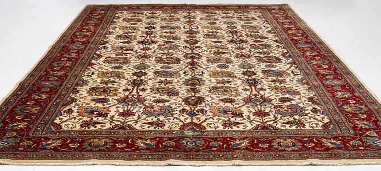 A Tabriz carpet, Northwestern Iran, of Safavid 'palmette' design, c, 483 x 302 cm.