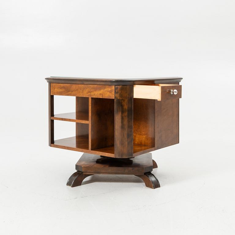 Rotating table with fitted bar, 1930s/40s.