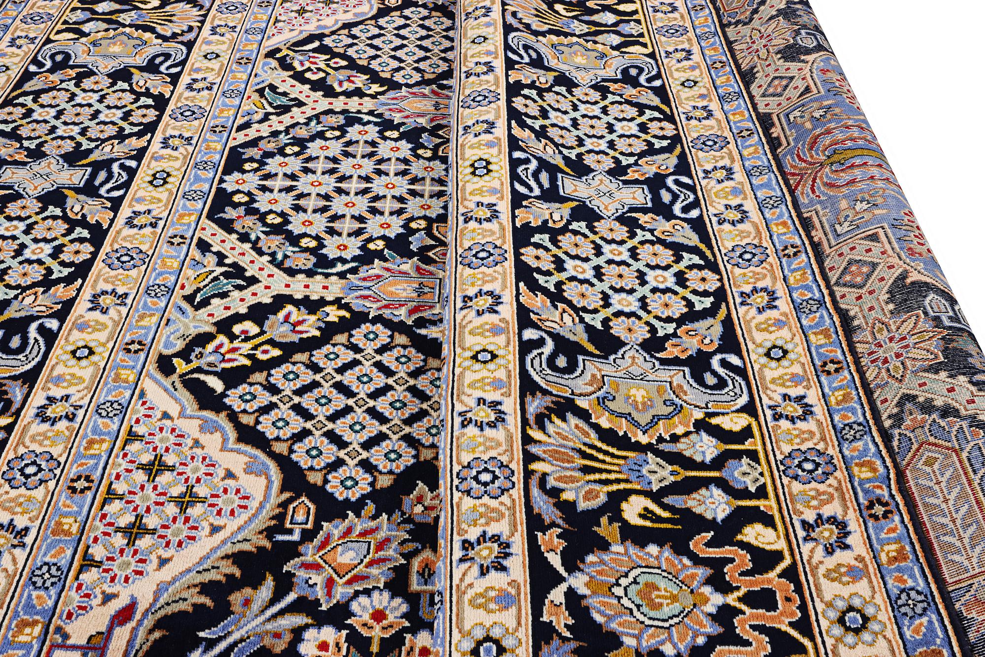 A Kashan carpet, c. 407 x 285 cm.