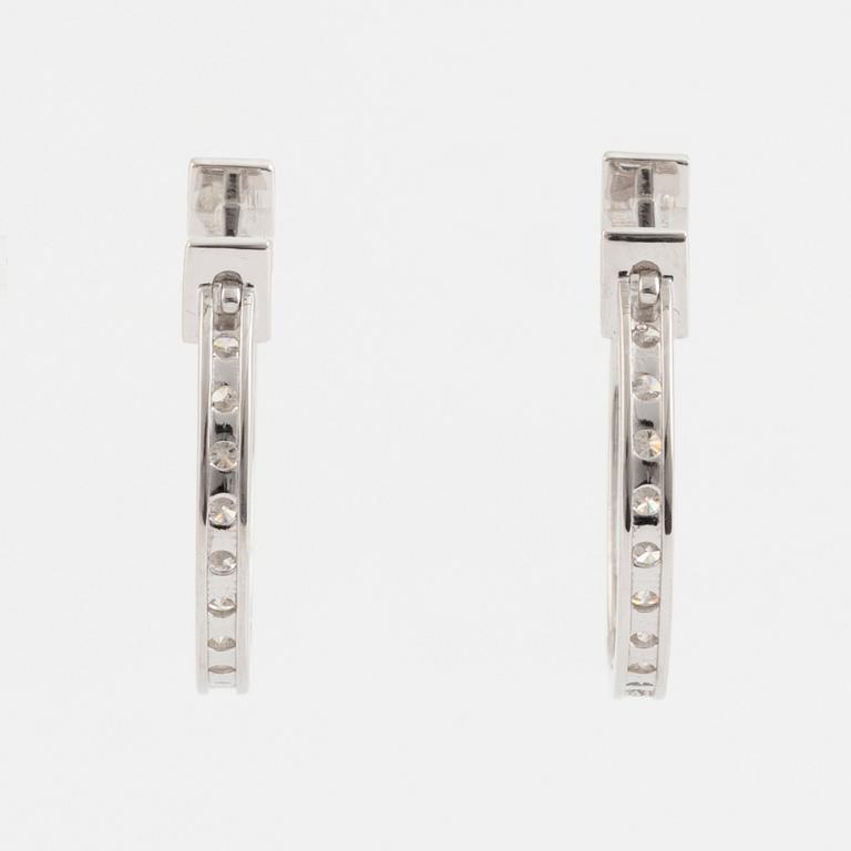 Brilliant cut diamond hoop earrings.