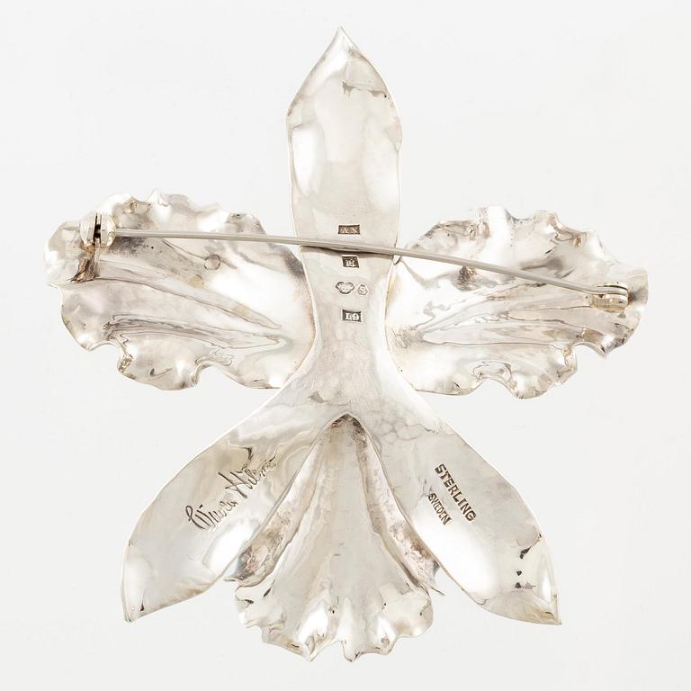 Wiwen Nilsson, a brooch, in the shape of a lily, sterling silver, Lund 1961.