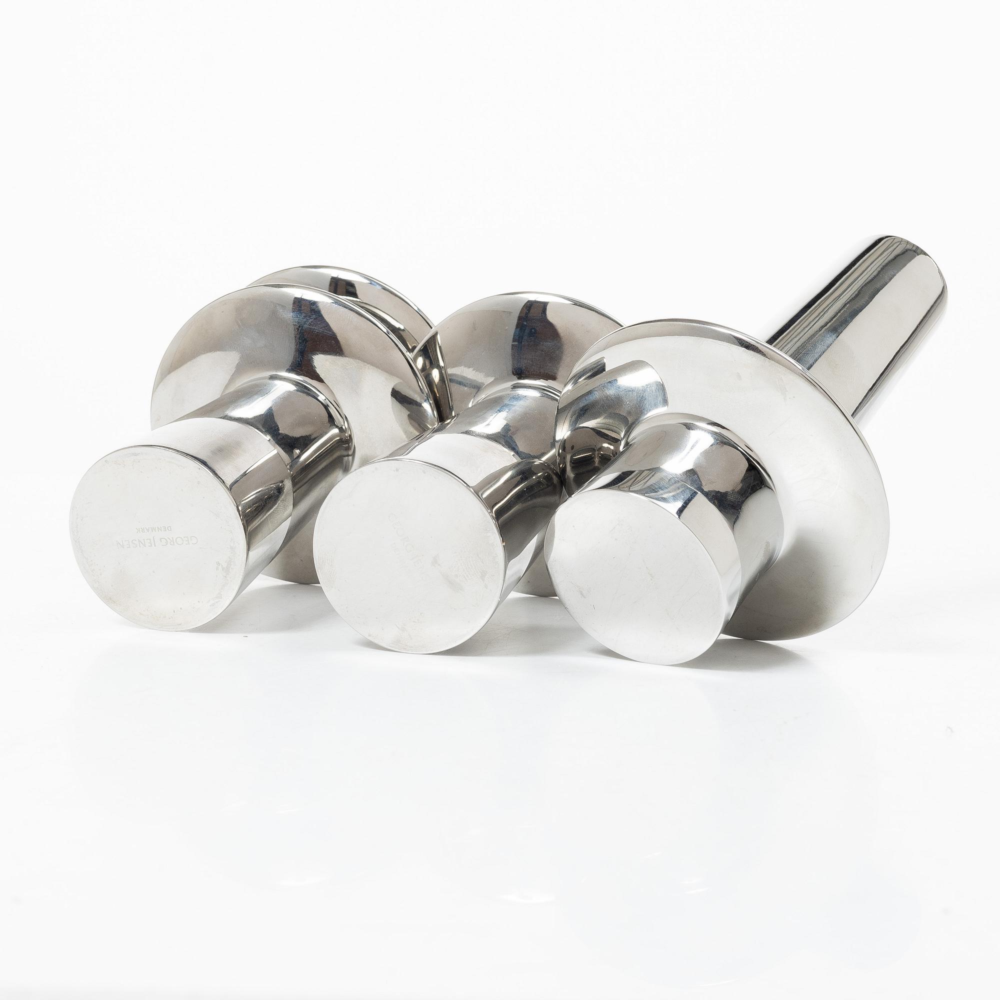 Georg Jensen, Three 'Ellipse' candelabra.