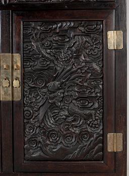 A Chinese hardwood cabinet, early 20th Century.
