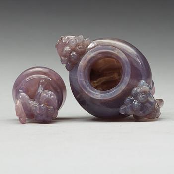 An amethyst tripod censer with cover, China, early 20th Century.