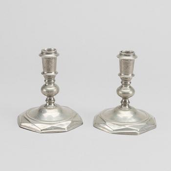 A PAR OF PEWTER CANDLESTICK  BY FIRMA SVENSKT TENN 1924.