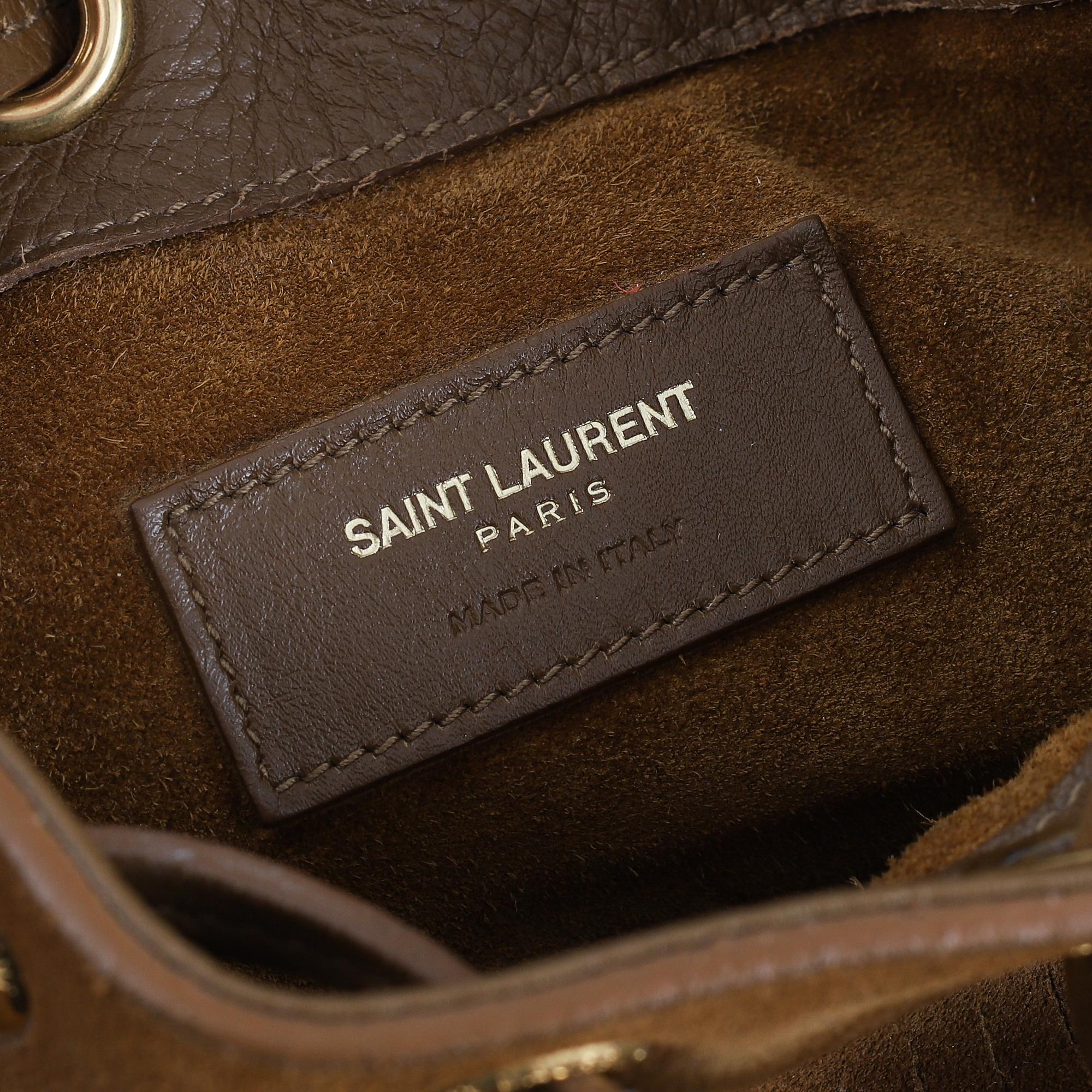 Yves Saint Laurent, a suede fringe handbag.