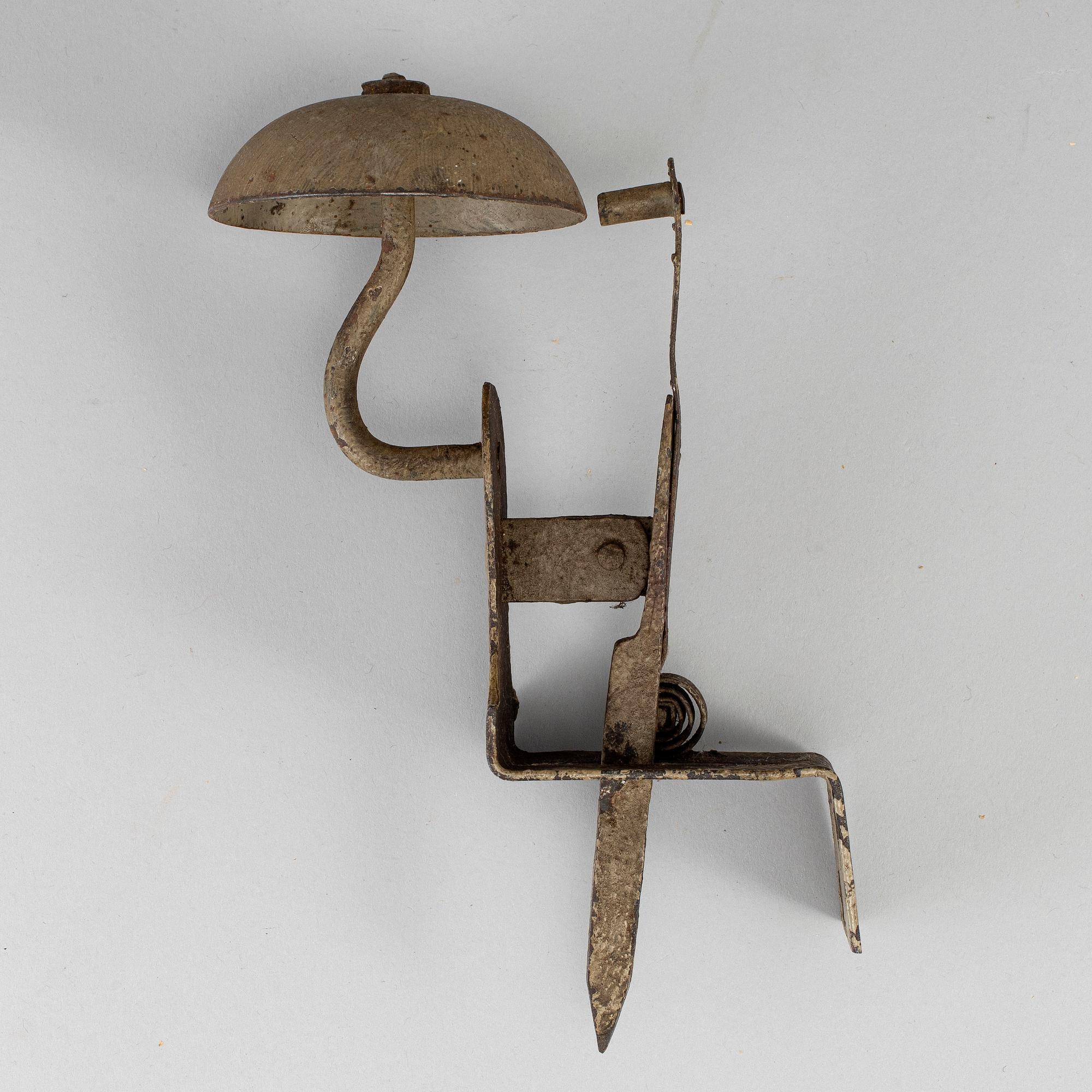 A 19th century iron door bell.