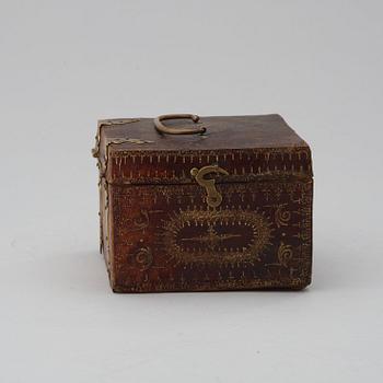 A Baroque 17th century traweller's clock in original case.