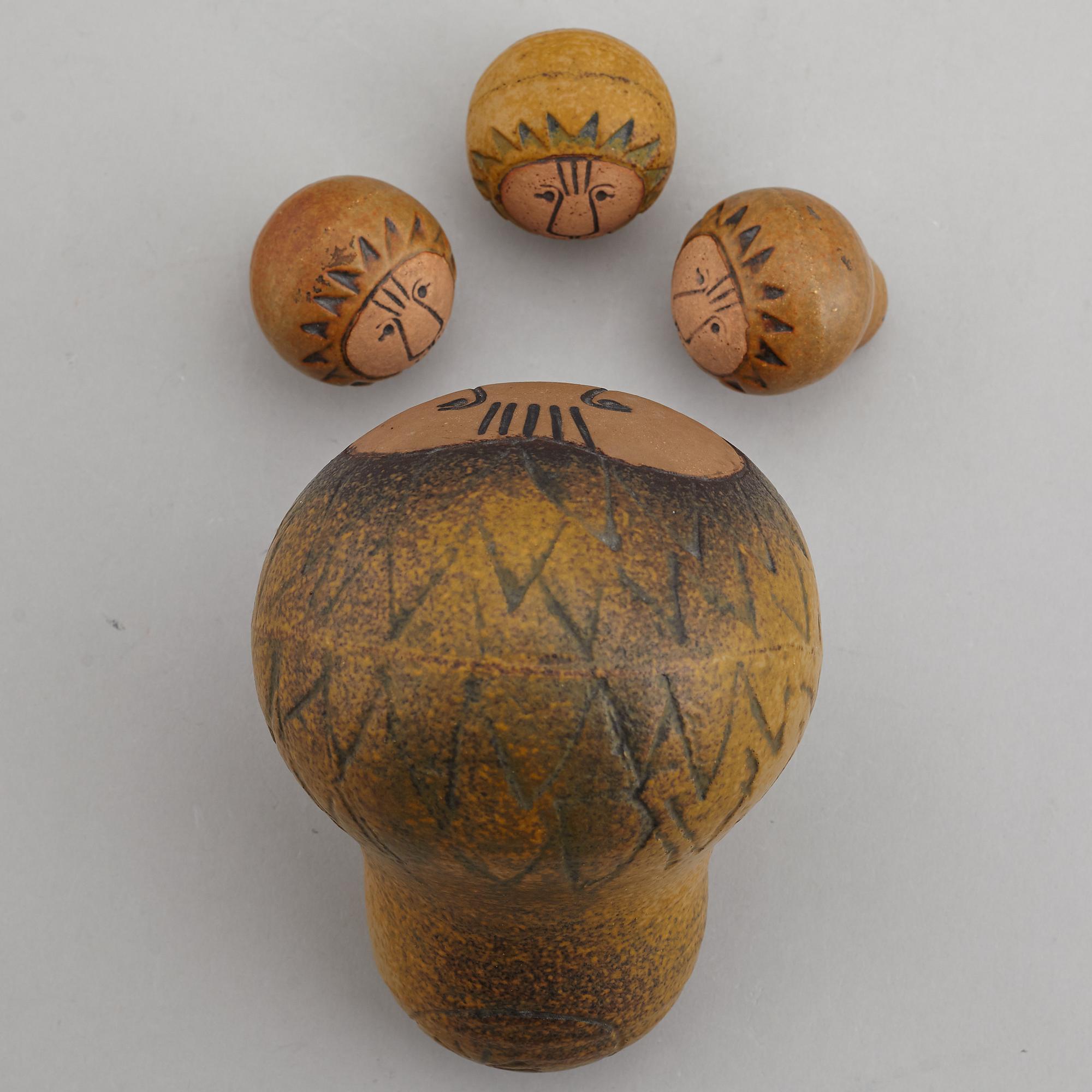 LISA LARSON, four stoneware lion figurines, Gustavsberg.