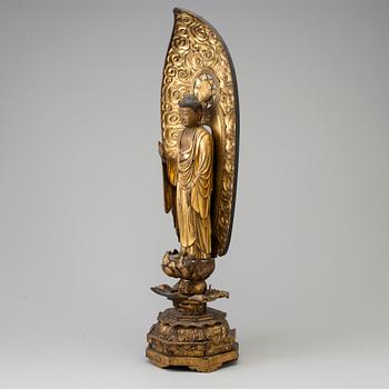A large wooden lacquered figure of buddha, Japan, 19th Century.