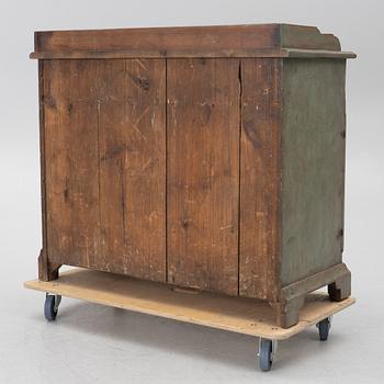A 19th century sideboard.