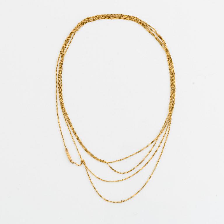 Long gold chain.