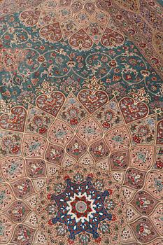 A CARPET, Old silk Qum, signed Moghadam, ca 309,5 x 190,5 - 193 cm.