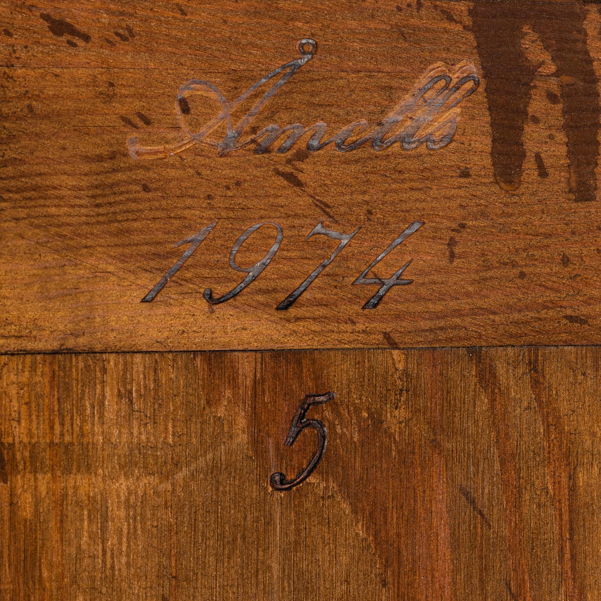 A vitrine cabinet from Åmells, dated 1974.