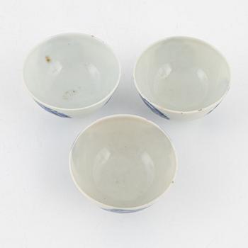 Six blue and white porcelain spoons and three cups, China, late Qing dynasty.