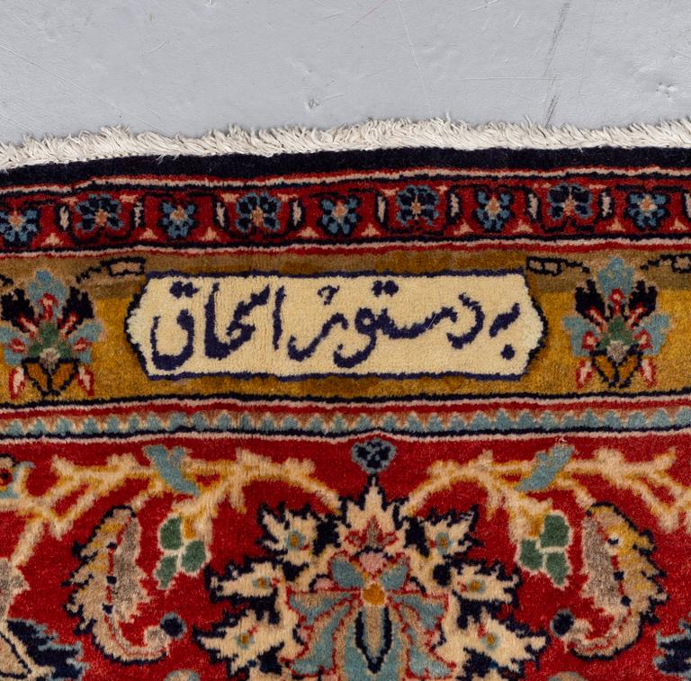 A CARPET so called Royal Kashan, part silk, signed, ca 483 x 311 cm.