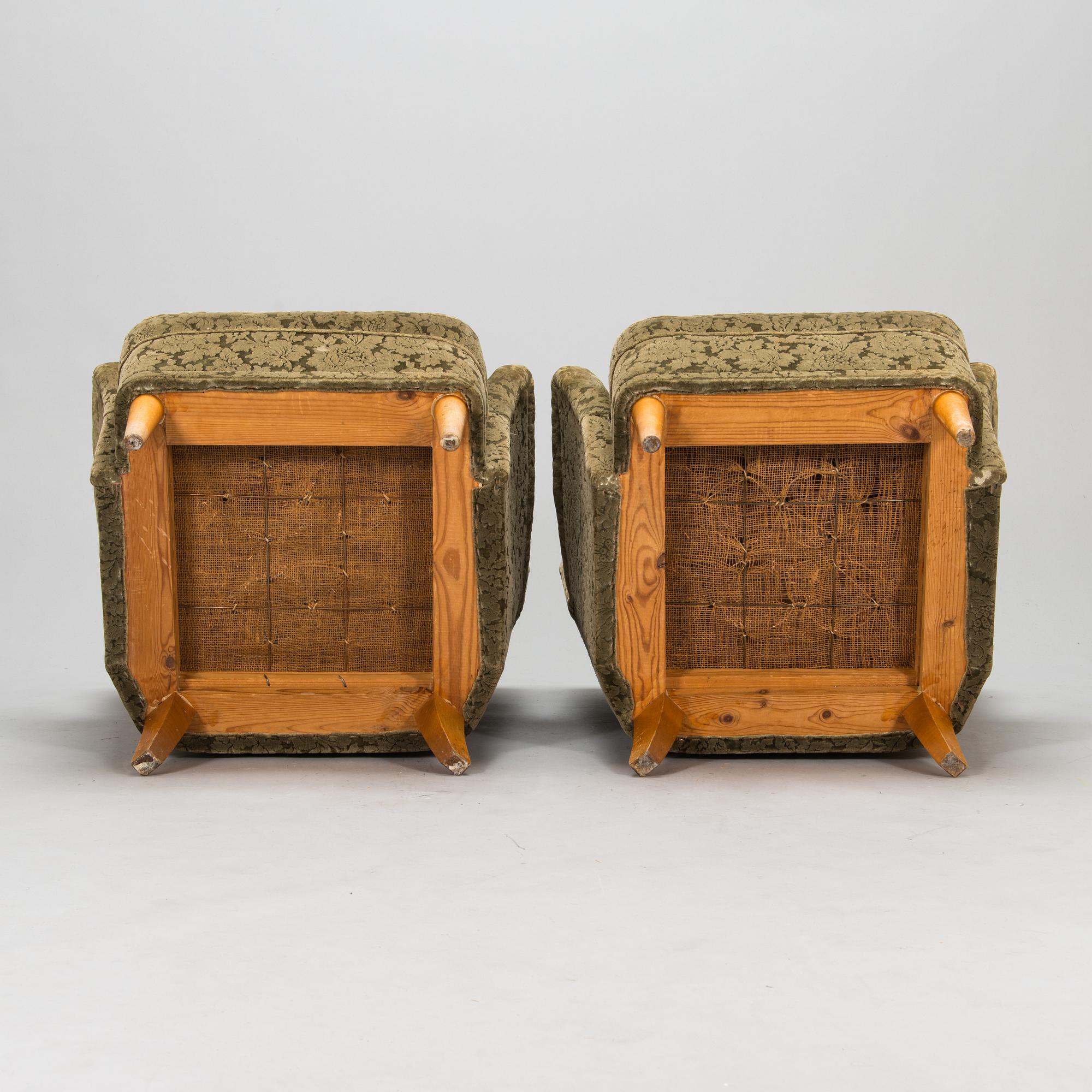 A pair of 1950s armchairs.