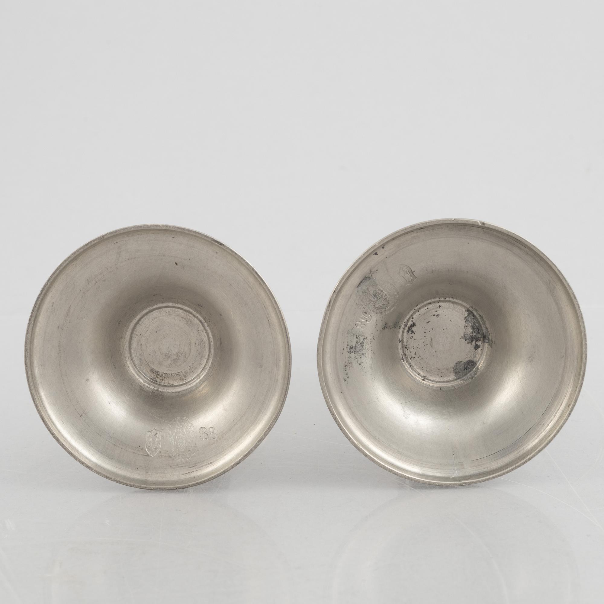 A pair of pewter candle sticks, model A702, Firma Svenskt Tenn, Sweden, 1928.