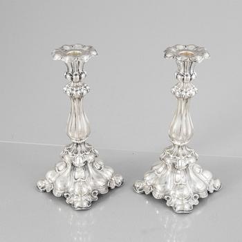 A pair of Baroque style silver candlesticks, mark of CG Hallberg, Stockholm 1936.