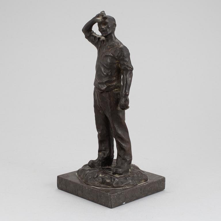 An Eric Hedland bronze sculpture.