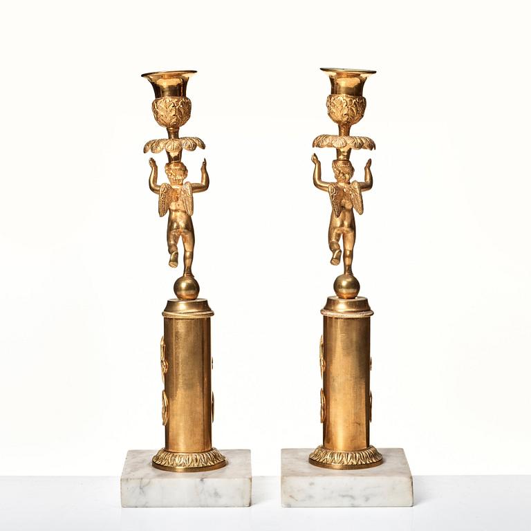 A pair of late Gustavian candlesticks.
