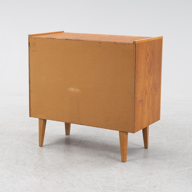 A teak veneered chest of drawers, Häggeryda Möbelfabrik, Nilsson & Co, Glimåkra, 1950's/60's.