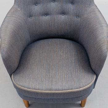 A lounge chair by Carl Malmsten, around the mid 20th century.