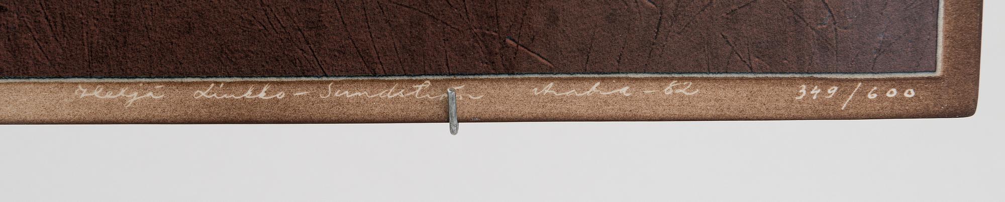 Heljä Liukko-Sundström, A ceramic wall plaque signed and dated Arabia -82, 349/600.