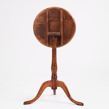 A burr-alder tilt-top table by J. Sjölin (master 1767-1785).