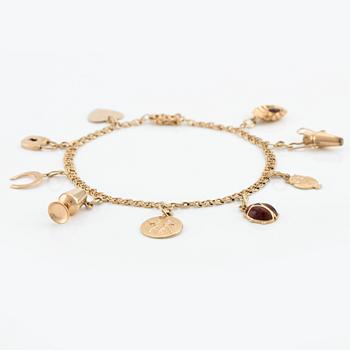 Armband, 18K guld, med berlocker.