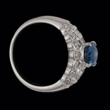 A untreated sapphire, 2.11 cts, and diamond, 0.75 cts in total, ring.