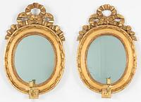 A pair of late Gustavian one-branch girandoles, Sweden, circa 1800.