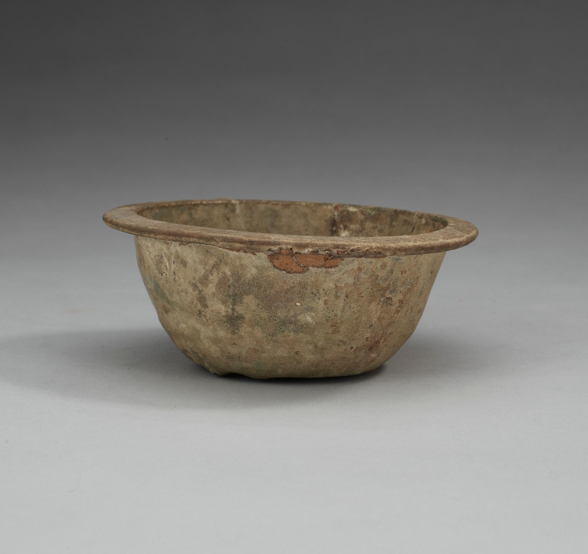 A green glazed bowl, Han dynasty (206 BC – 220 AD).