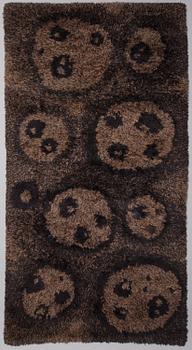 A Karhunkäpälä (Bear Paw) Pohjanlahti rug manufactured by Villayhtymä Oy, 1960.